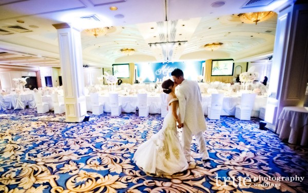 Bride and groom in ballroom at US Grant ballroom