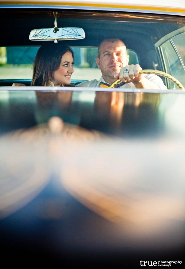 San Diego Wedding Photography: Engagement photos at the Oceanside swat meet in an old car