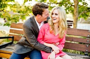Engagement-photo-laughing-on-bench-