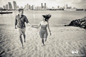 Coronado engagement photo shoot running on beach