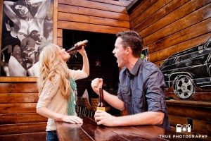Little Italy Engagement shoot couple drinking beer