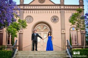 Old Town engagement shoot of couple standing at top of stairs