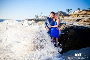 Windansea engagement photo shoot of wave crashing