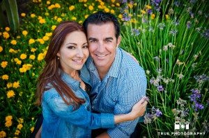couple in natural field setting at Seaport Village Engagement Photo Shoot