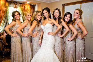 Bridesmaids pose for photo before ceremony