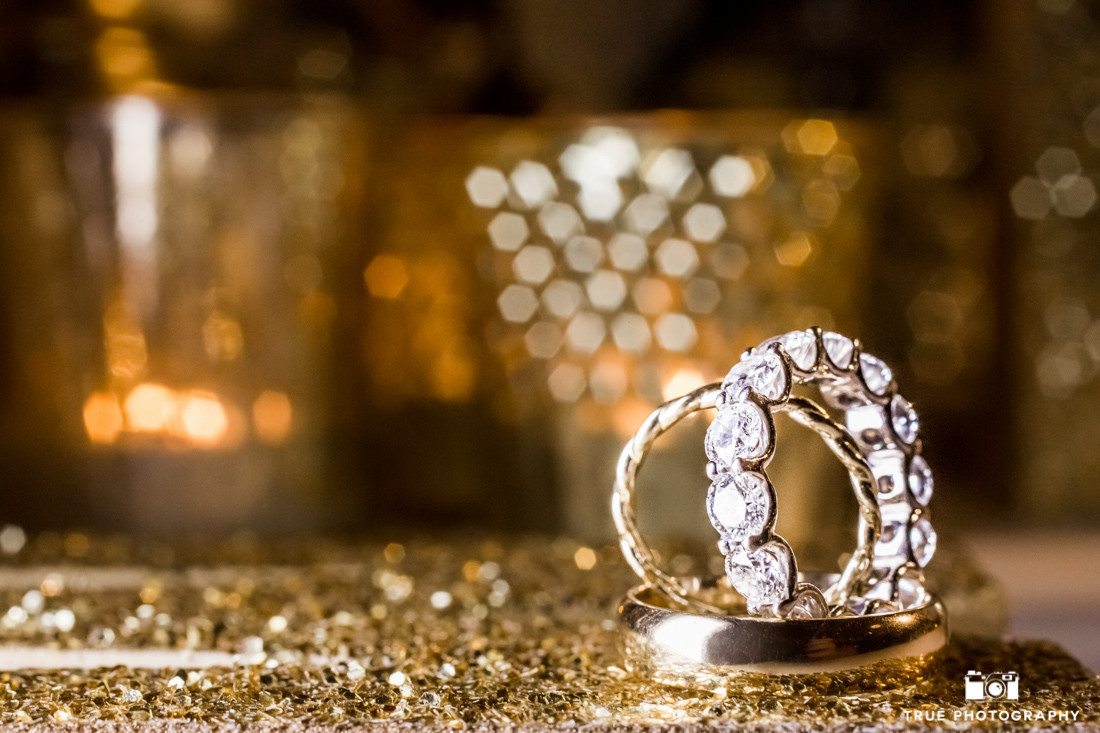 Macro photograph of diamond wedding ring and bands