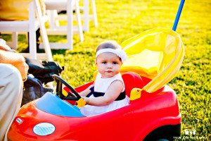 Cute baby attends wedding in toy car