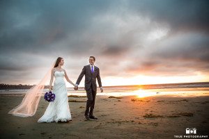 Bride and groom portrait by the beach