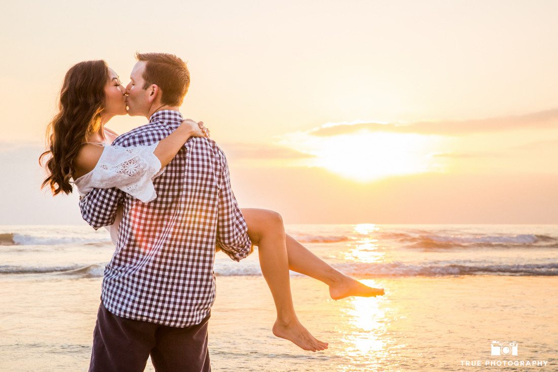 Beach Sunset Engagement Photo Kiss