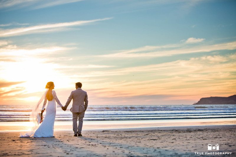 Sunset newlyweds portrait on the beach at Coronado Island