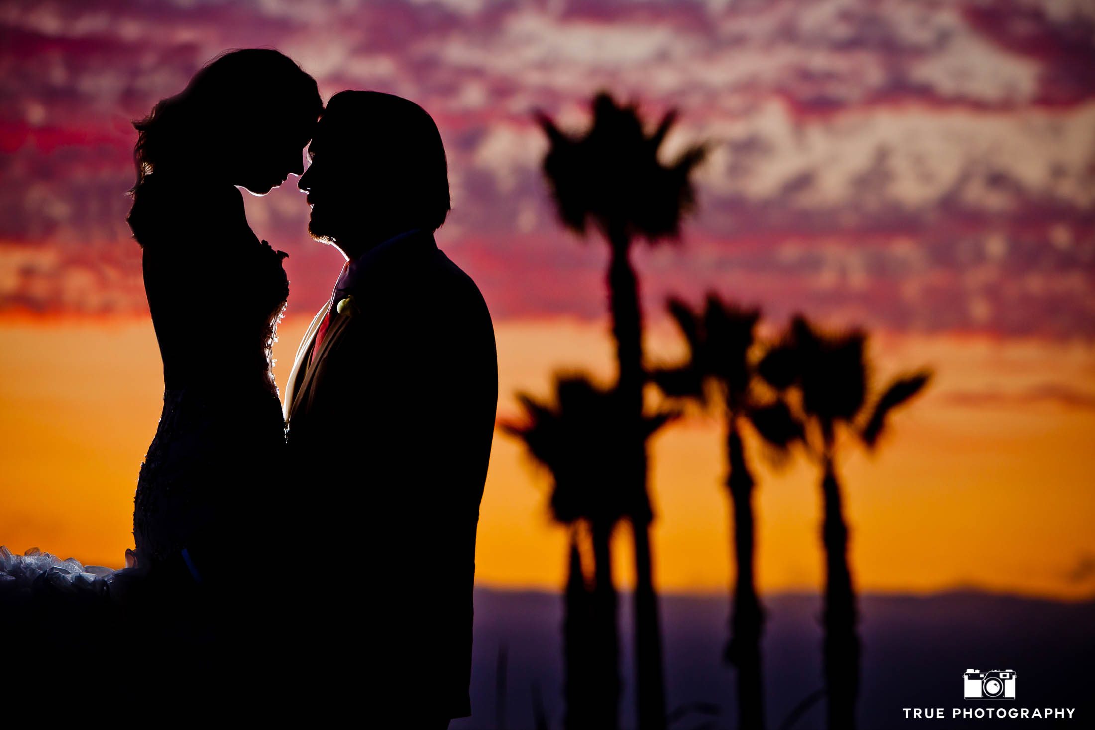 San Diego, California newlyweds taking sunset portrait