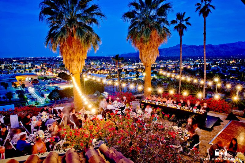 Aerial view of outdoor reception overlooking city lights