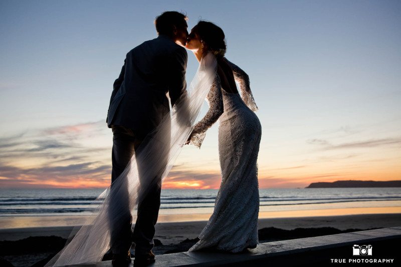 Coronado beach sunset portrait of bride and groom