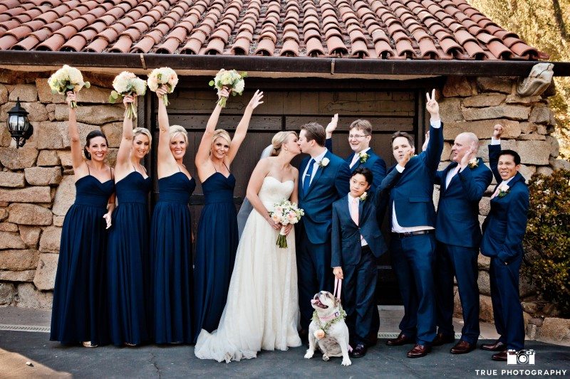 Bridal party photo with a bulldog