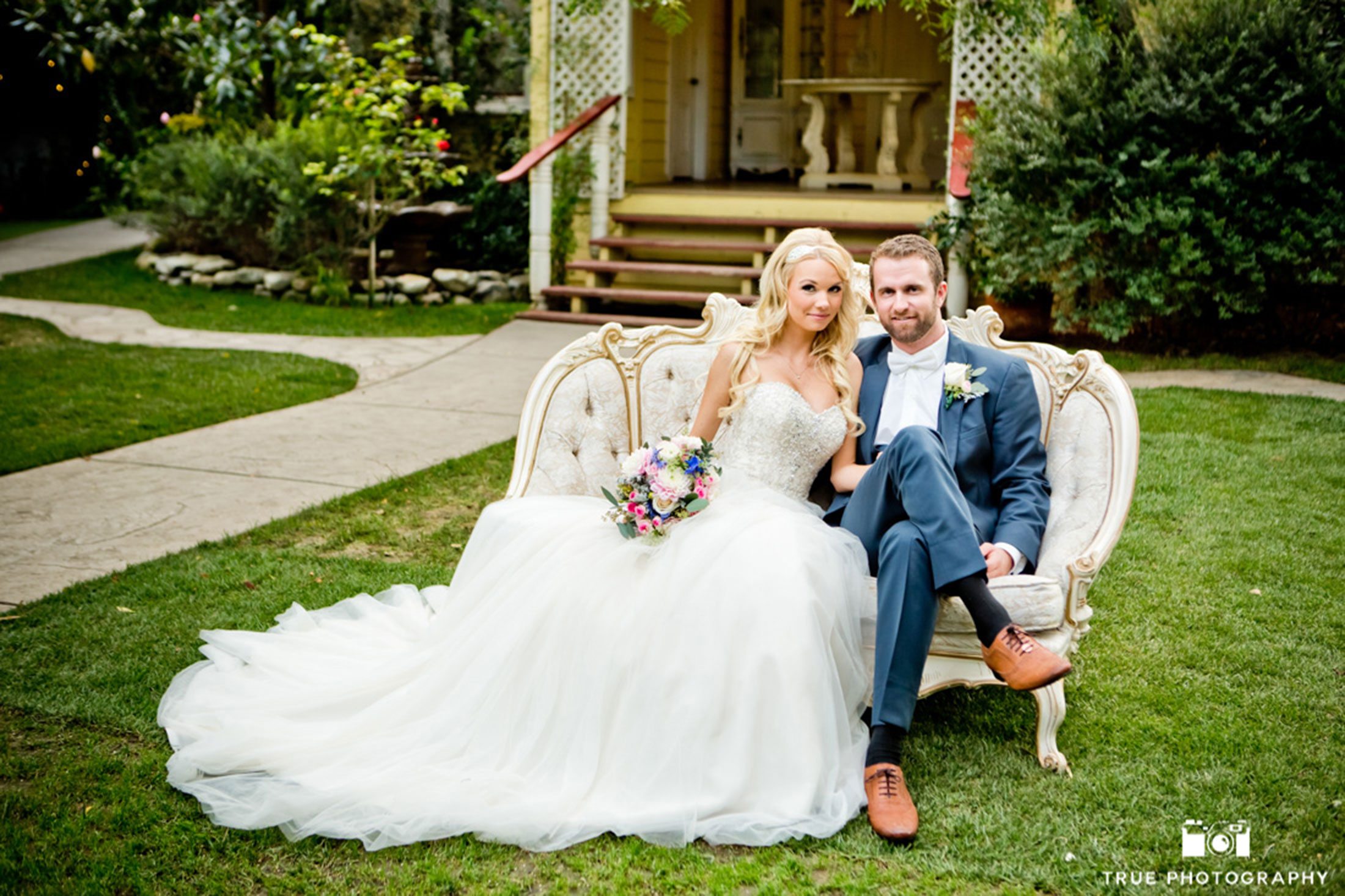 Bride and groom with style and vintage furniture