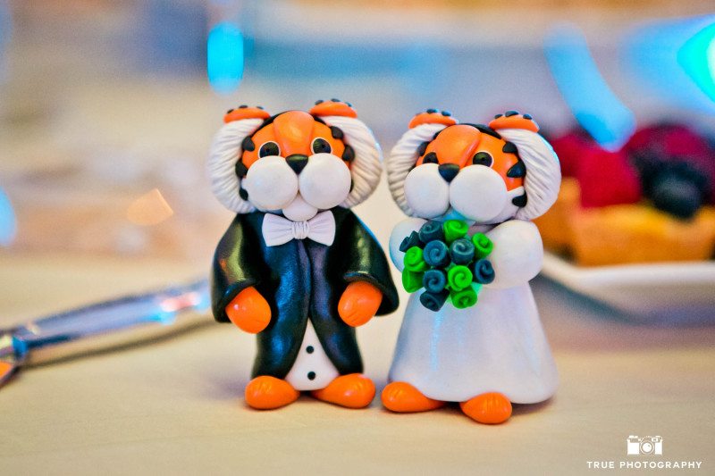 Cute, tiger-themed bride and groom cake topper