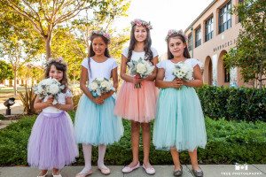 Flower girls in different colored tutus and flower crowns