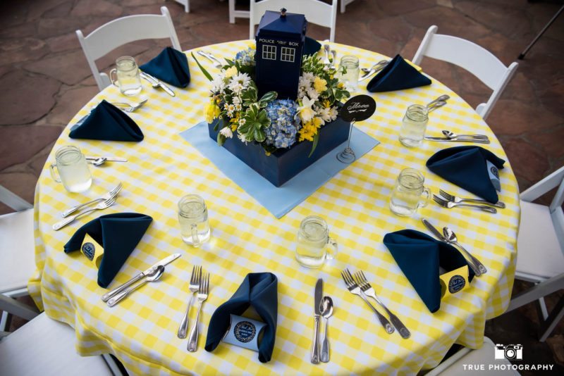 Blue and Yellow checkered reception table with Dr. Who centerpiece