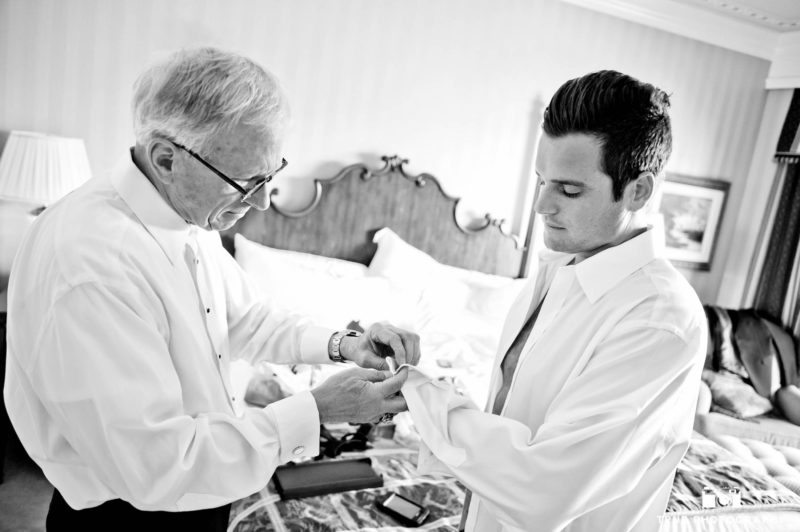 Groom's Father helps put on Cufflinks during Pre-Ceremony