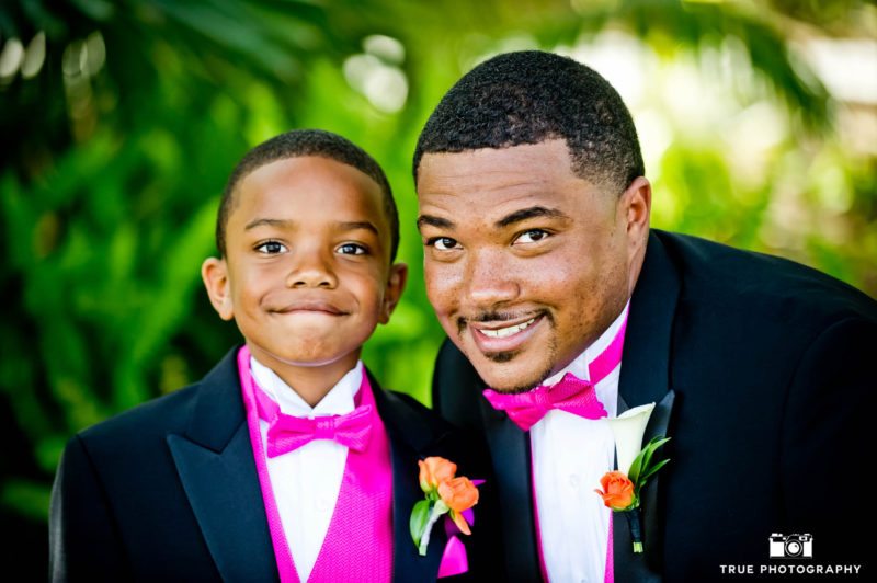 Groom and His Son in matching pink bow ties