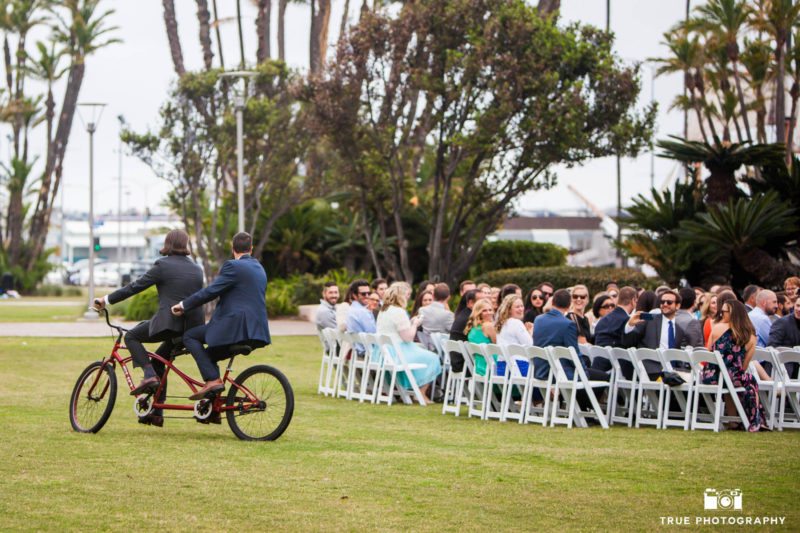 Groom and Officiant on Tandem Biicycle