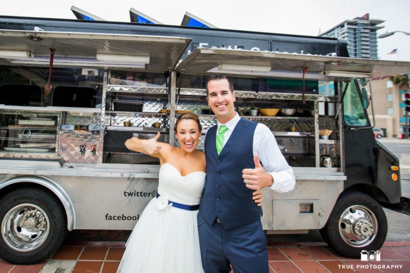 Happy food truck wedding couple