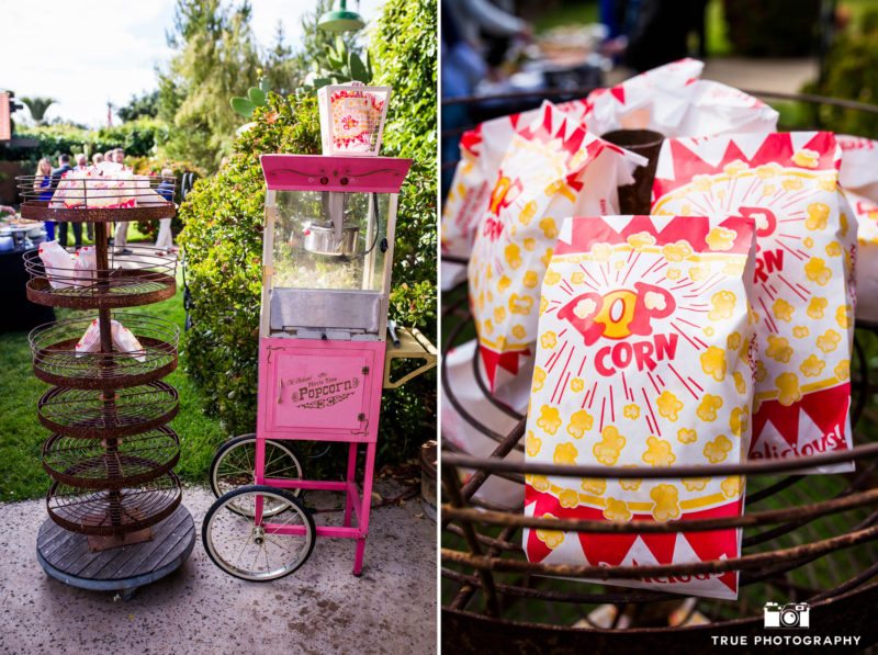 Fun and creative vintage popcorn machine during rustic outdoor wedding reception