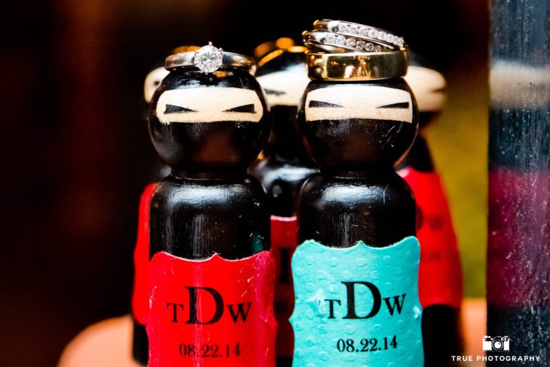 Wedding couples rings paired with funny ninja detail at wedding