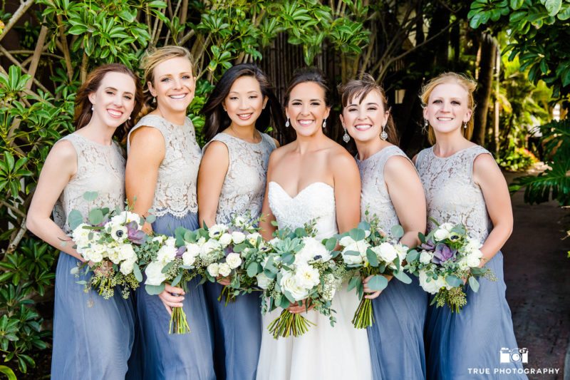 Bridesmaids in two-piece dresses with Bride
