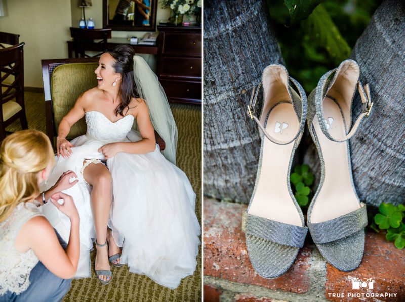 Bridesmaid helps Bride put on shoes