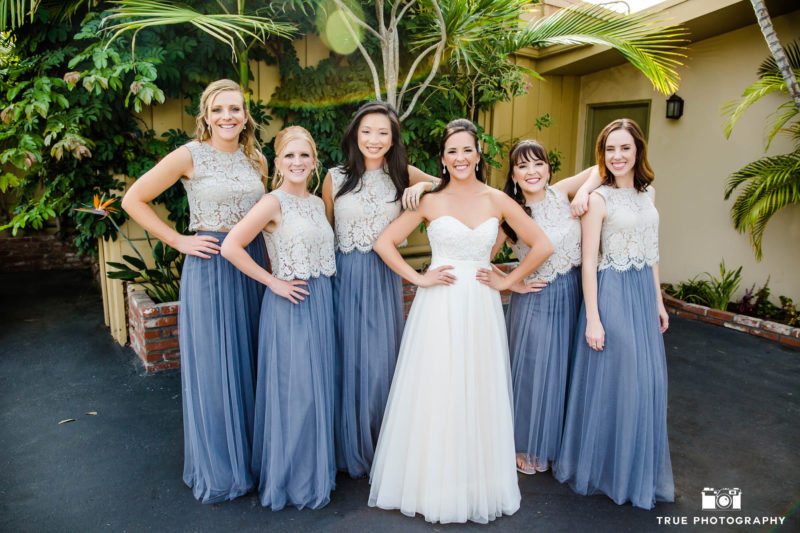Bridesmaids laugh and smile