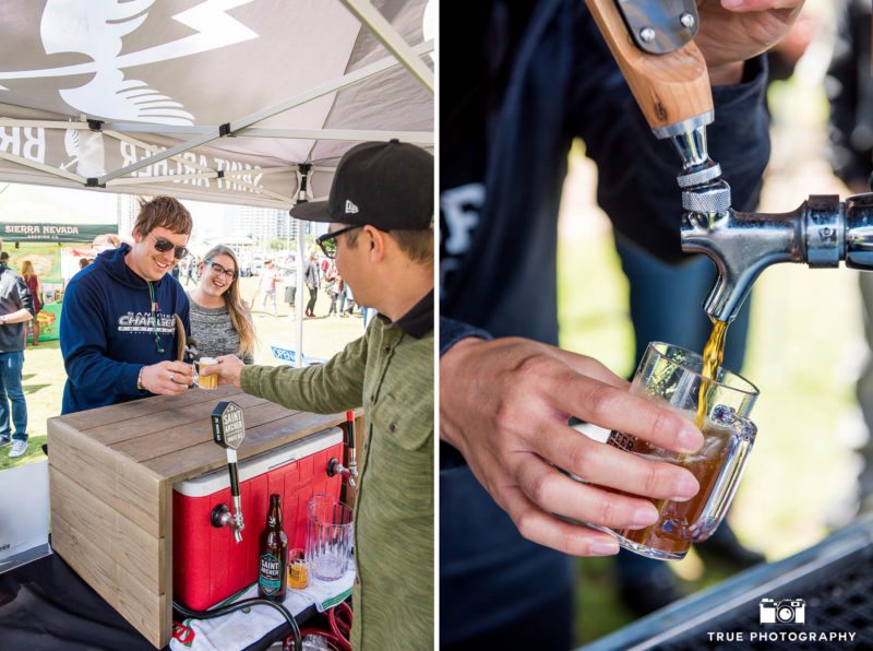 Event goers taste beer samples from St. Archer Brewery during Best Coast Beer Fest in Downtown San Diego, California