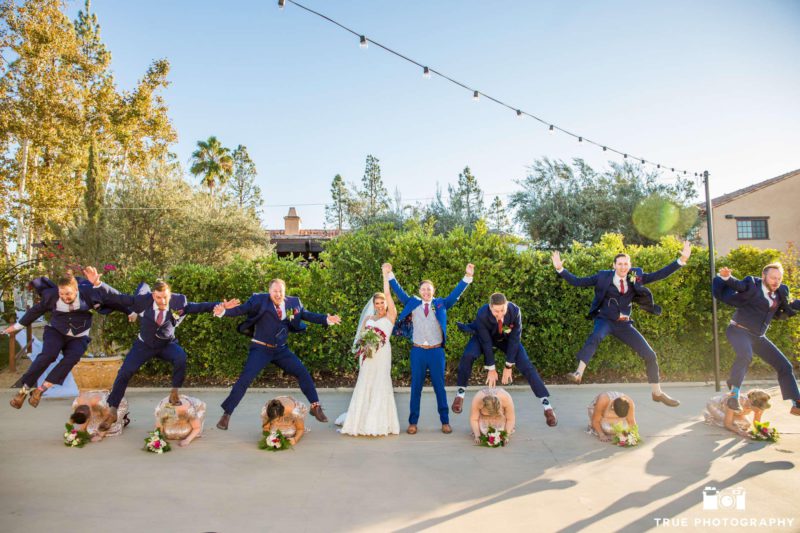 fun wedding party jumping