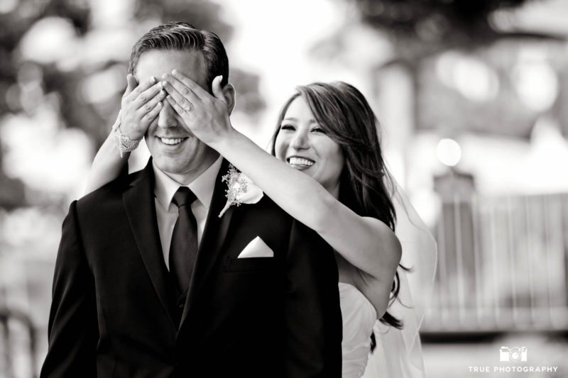 Bride sneaks up on groom for their first look