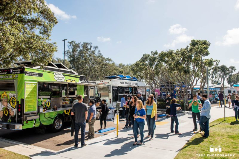 Eventgoers wait in lines for local food trucks at Best Coast Beer Fest