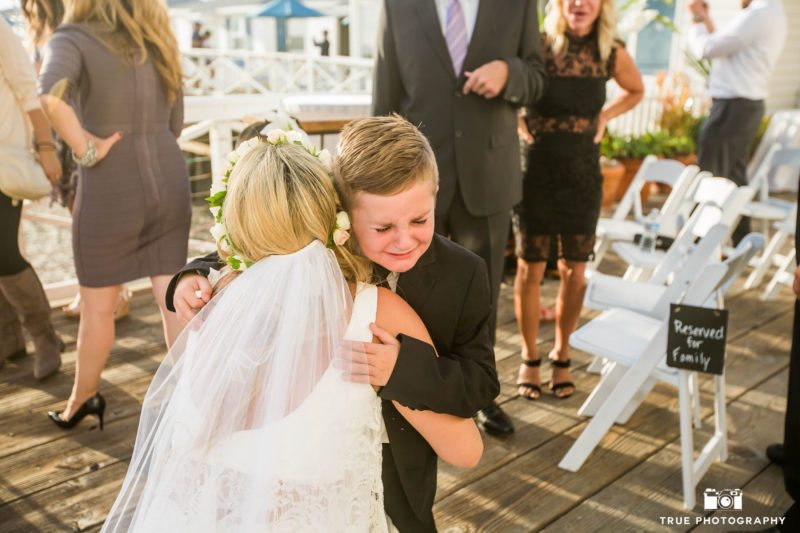 Ring bearer cries with joy.