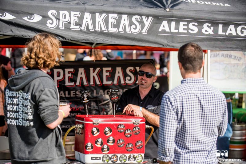 Speakeasy Ales and Lagers talk to eventgoers during cancer charity event, Best Coast Beer Fest