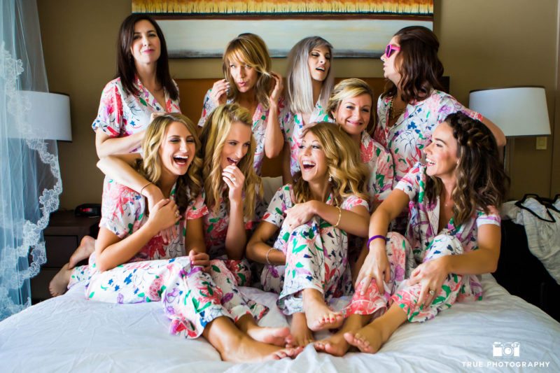 Candid photo of bridesmaids wearing pjs