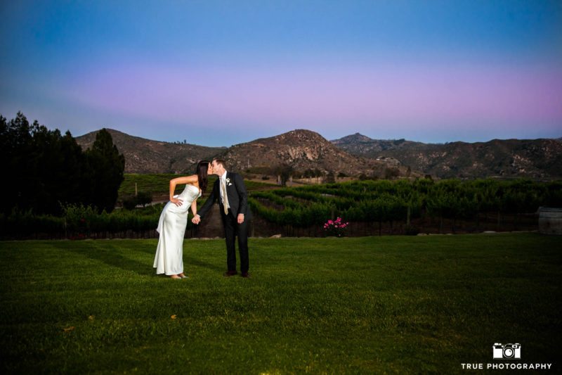Night photo of bride and groom during sunset