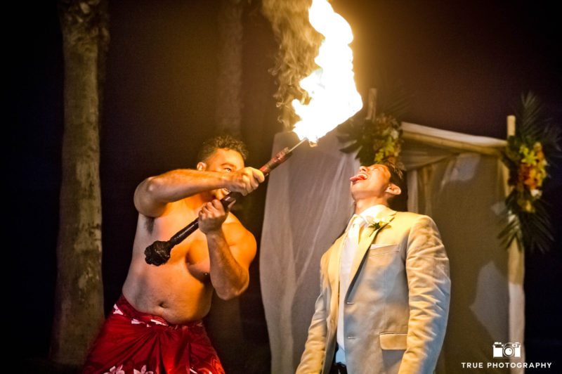 Groom and fire breathing performance