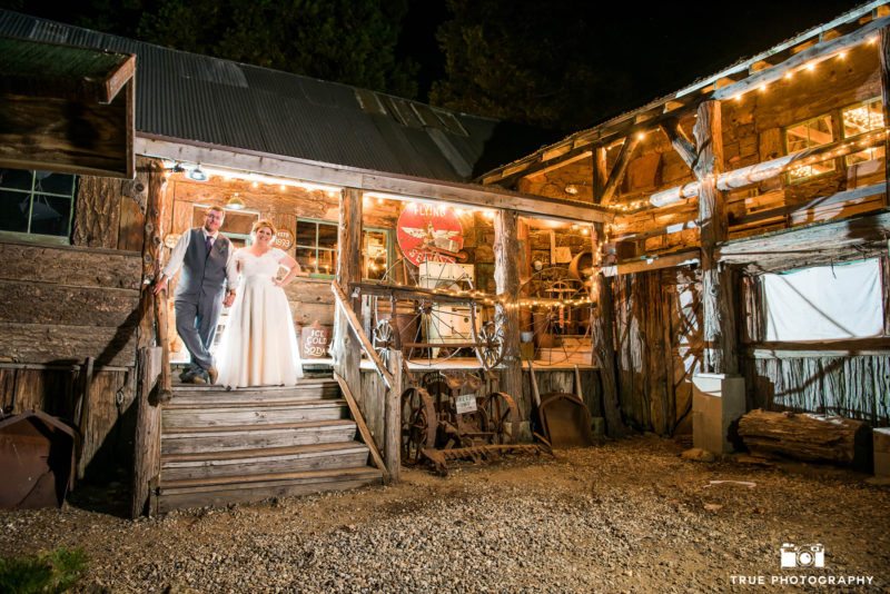 Night photo of bride and groom at Bailey's Palomar Resort