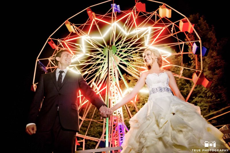Colorful ferris wheel wedding photo