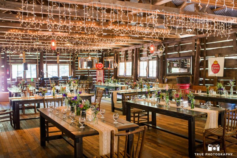 Indoor wedding reception inside wood cabin at bailey's palomar resort