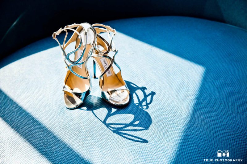 Bride's gold, shiny Jimmy Choo heels.