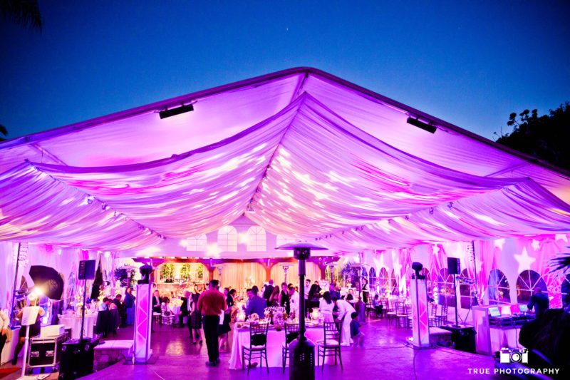 Colorful outdoor tented wedding reception