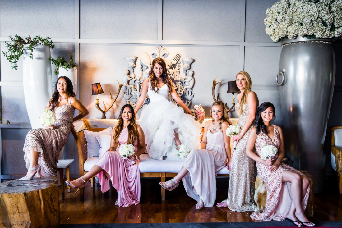 A classic San Deigo wedding trend of non matching bridesmaid dress captured by True Photography