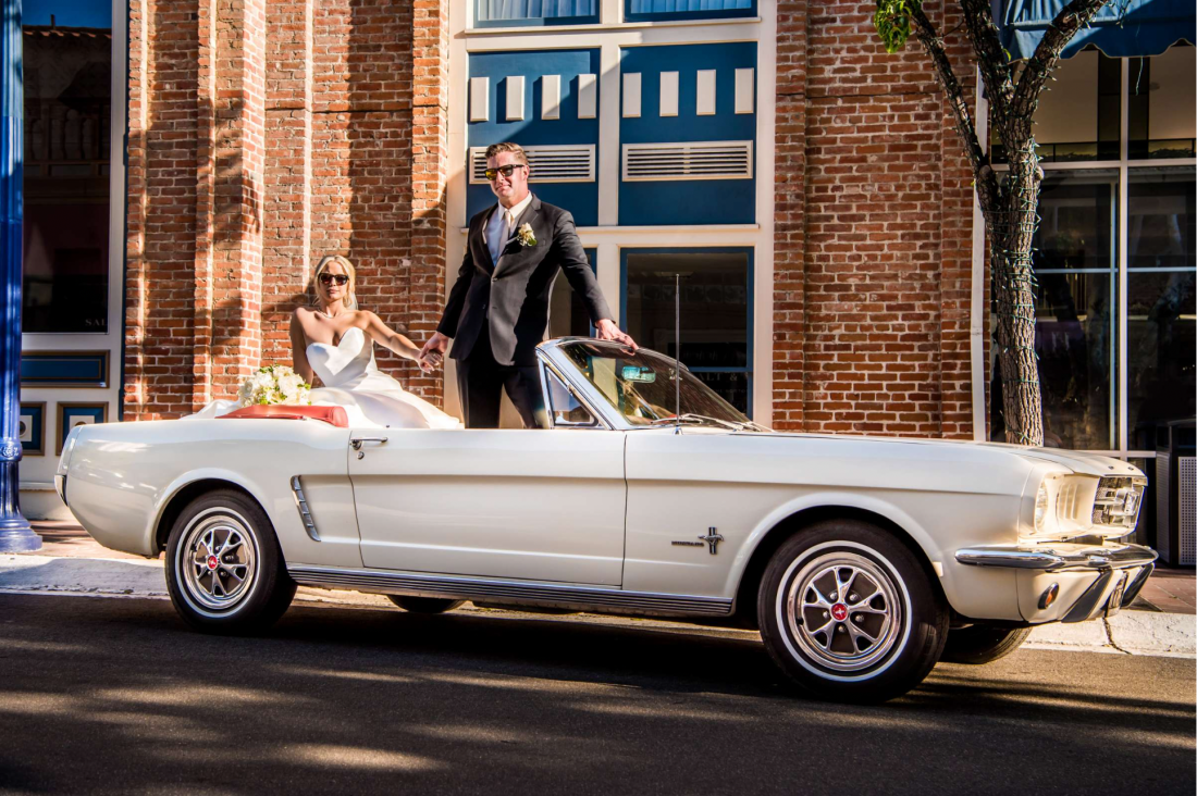 Professional San Diego wedding photographer captures couple in vintage mustang