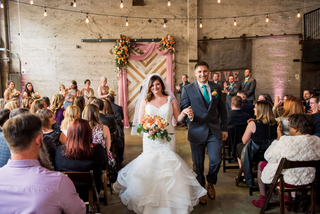 Wedding ceremony at Luce Loft in San Diego photographed by True Photography