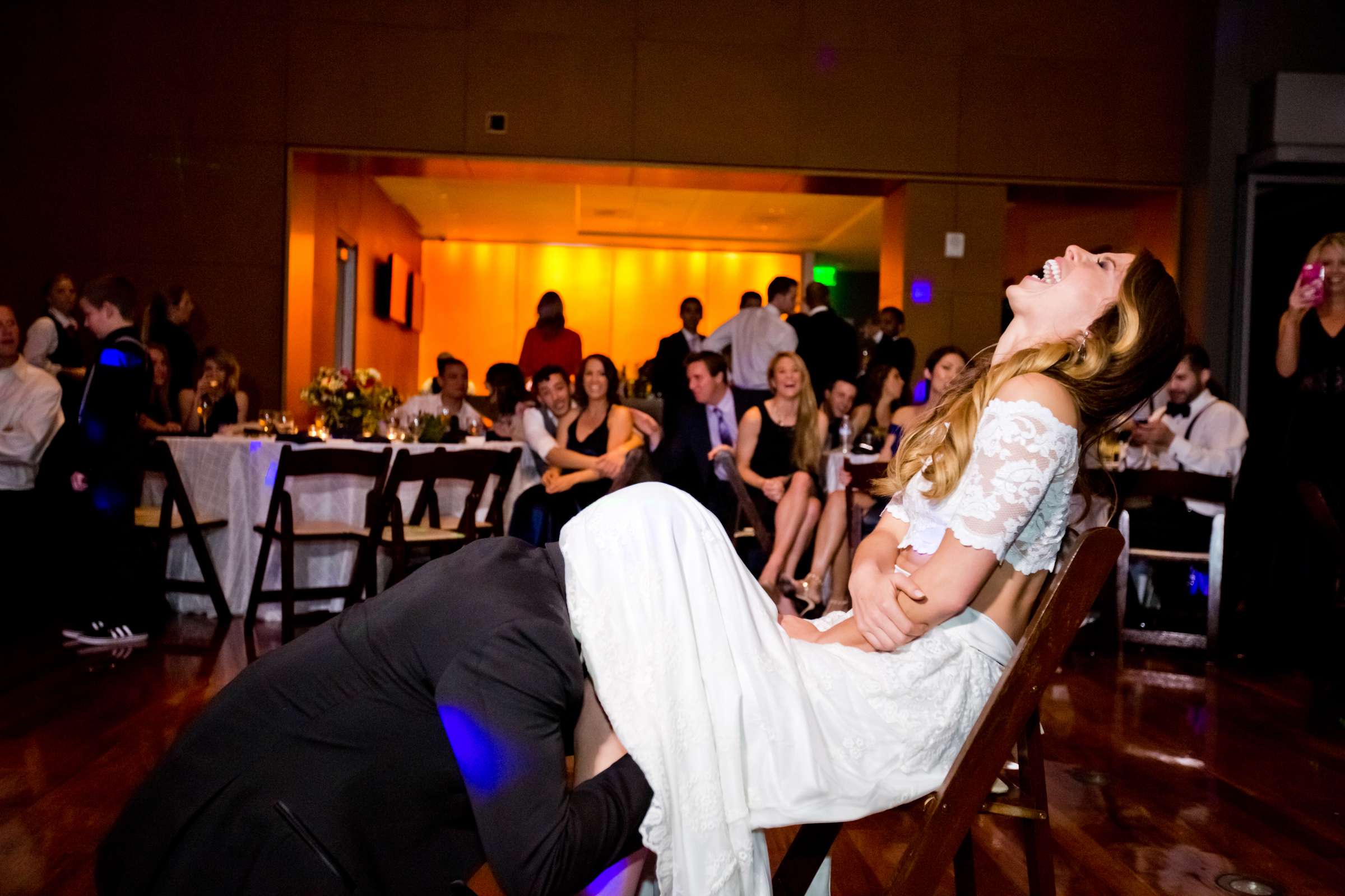 Bouquet and Garter Toss at Ultimate Skybox Wedding, Megan and Codie Wedding Photo #143991 by True Photography