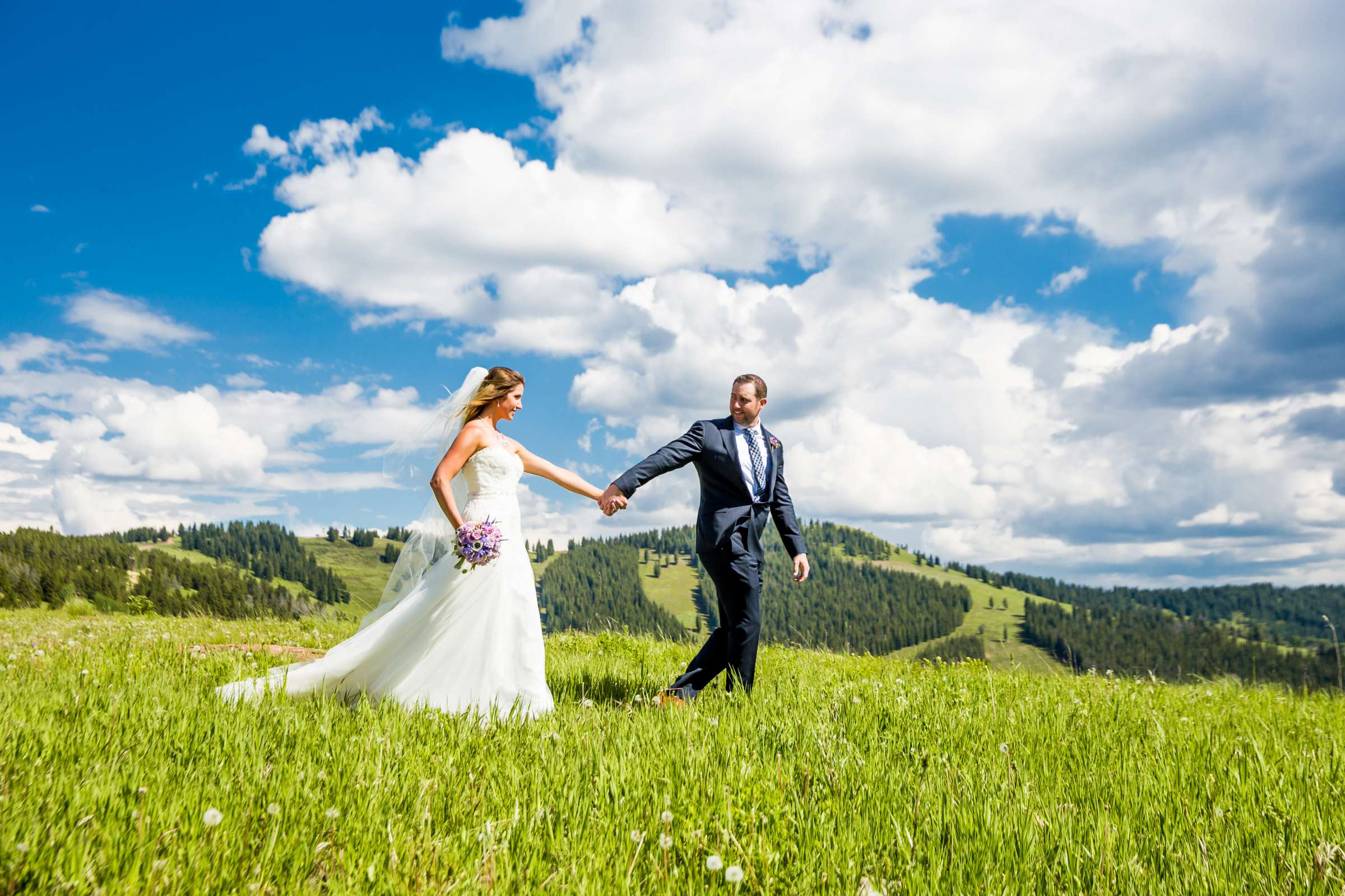 In a Field at The Vail Wedding Deck Wedding coordinated by Snapdragon Celebrations, Dana and James Wedding Photo #16 by True Photography